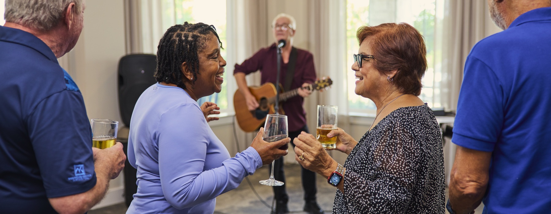 people having drinks and listening to music