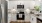a kitchen with white cabinets