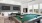 a pool table in a clubhouse game room